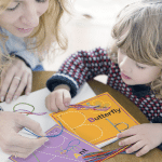 kids using wikki stix to trace letters