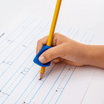 person writing using a pencil with a pinch grip