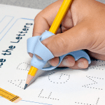 person tracing letters with a pencil using the elephant trunk training grip
