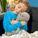 girl hugging the tickley tactile octopus