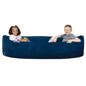 large sensory canoe with two kids