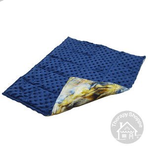 weighted lap pad with extra soft blue bumpy fabric on one side and marbled fabric on the other