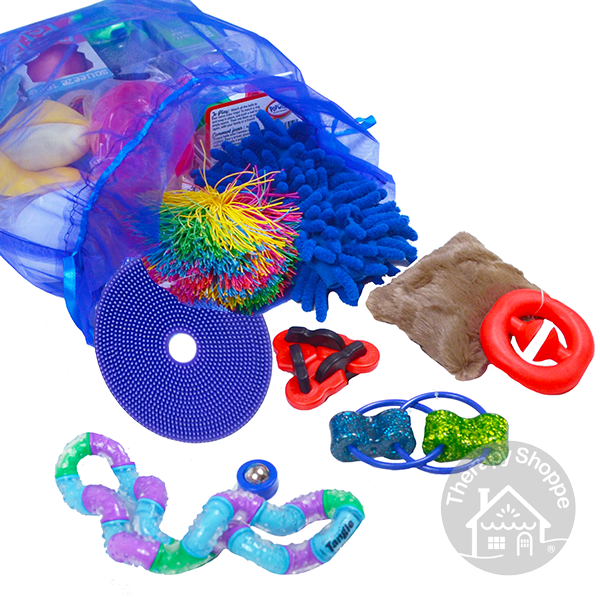 blue organza bag with several fidgets spilling out of it