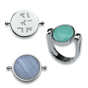 Spinner ring with a green gem. Blue gem and hidden message elements displayed next to it