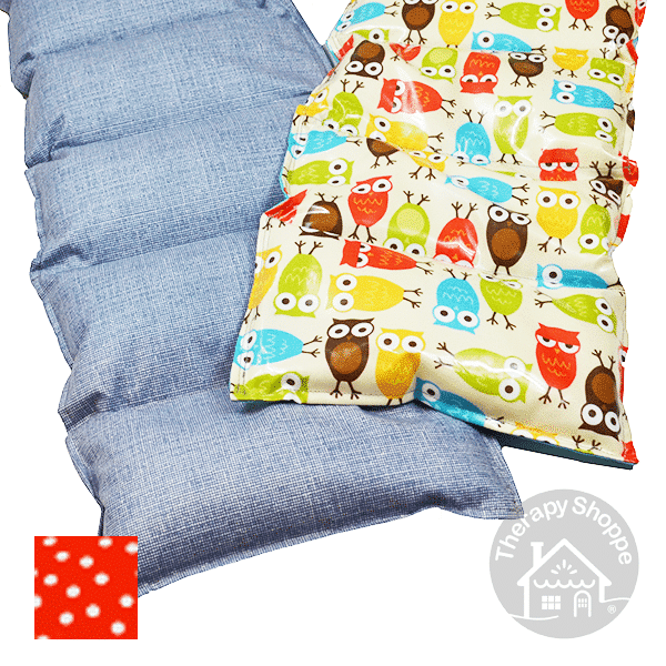 Wipe clean weighted lap pads. One has a blue denim pattern and the other has a colorful owl pattern
